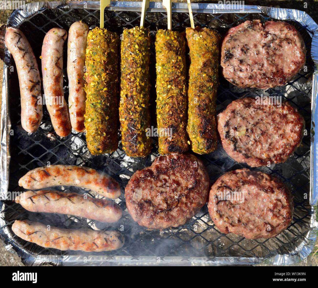 Disposable instant BBQ foil tray cooking ,beefburgers,sausages,and