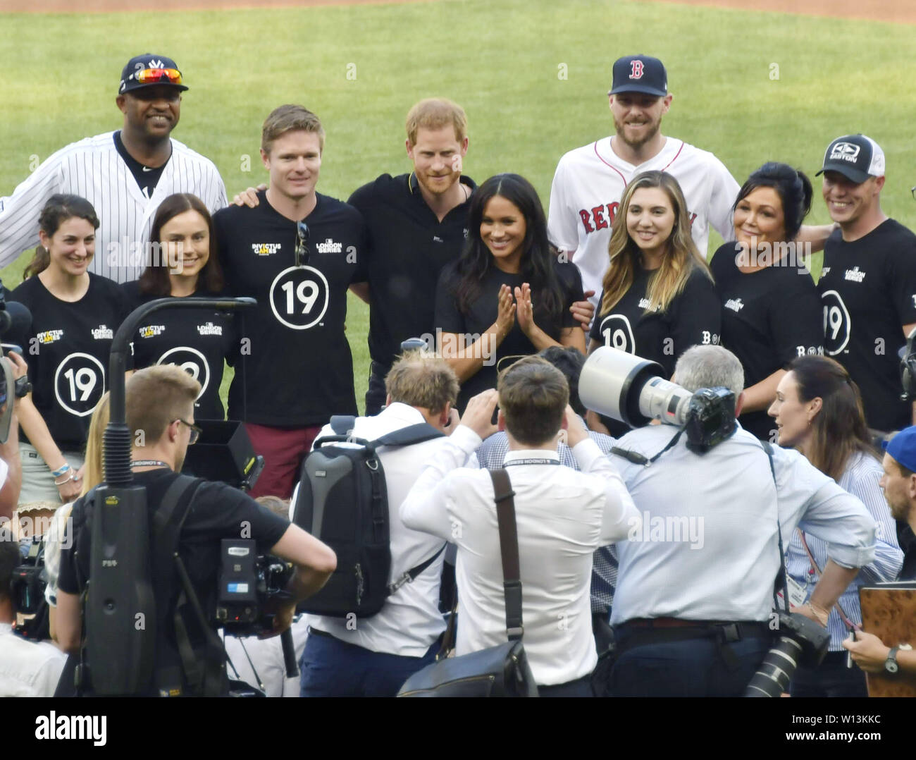 London, UK. 30th June, 2019. Britain's Prince Harry (back, C) and his