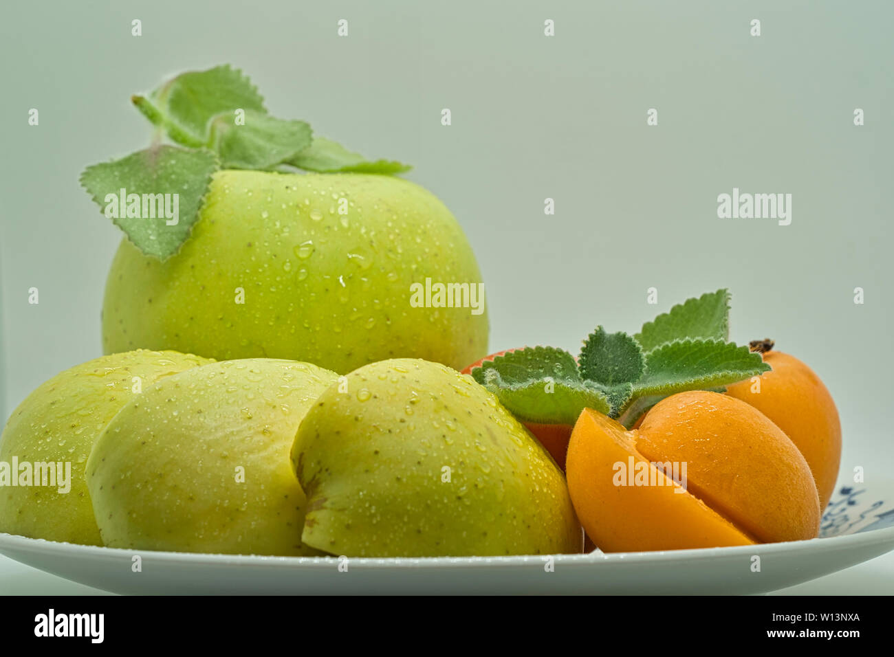 Apple and apricot healthy plate Stock Photo Alamy