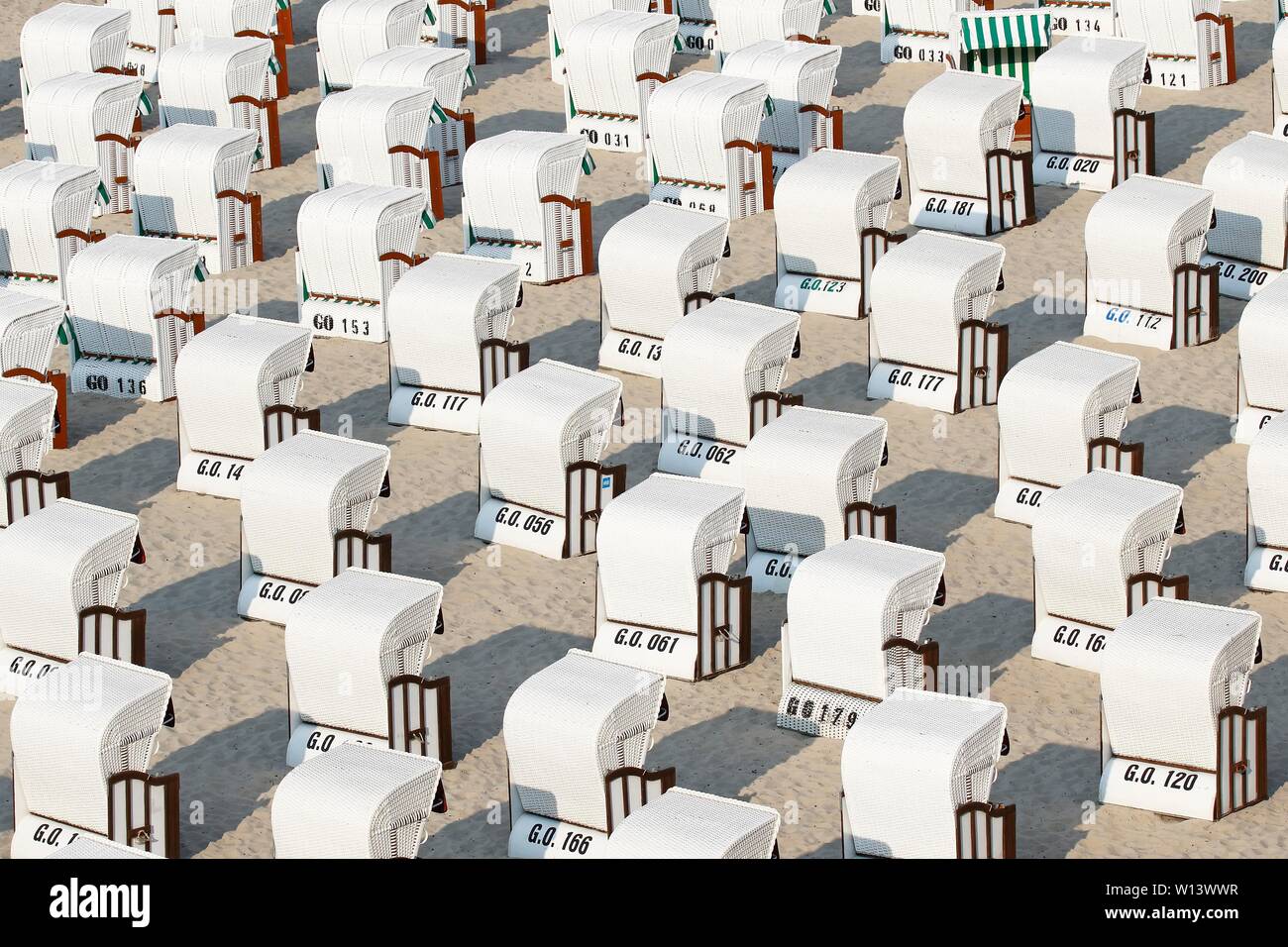 White beach chairs at the beach, Baltic seaside resort Sellin, island Rugen, Mecklenburg-Western Pomerania, Germany Stock Photo