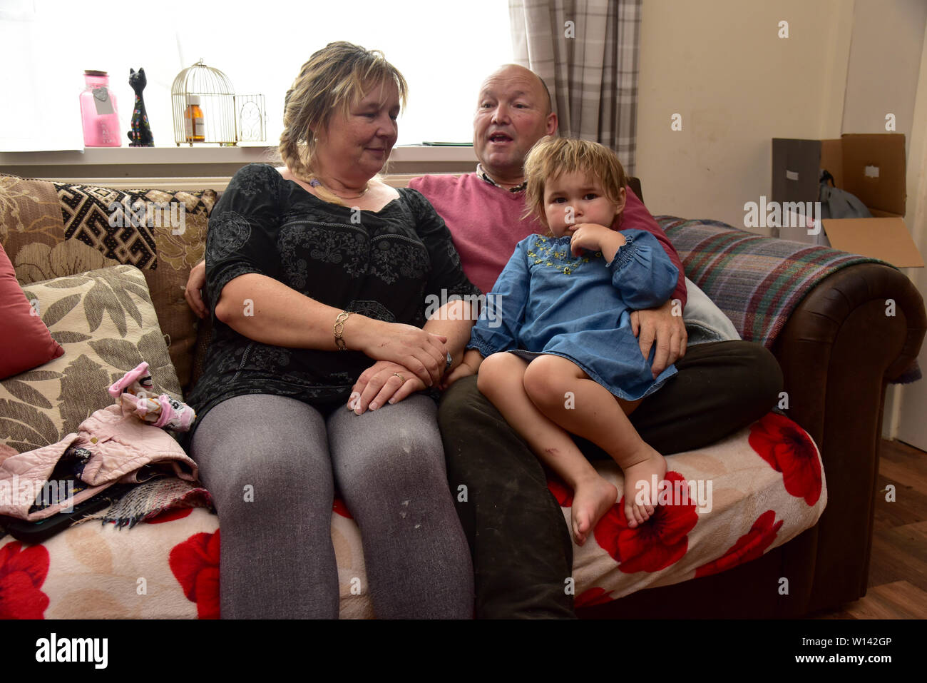 Romany Traveller  Tom Price at home in Pencoed with his partner Luanne, and daughter Maggie. He is also pictured at his smallholding with Galway Boss Stock Photo