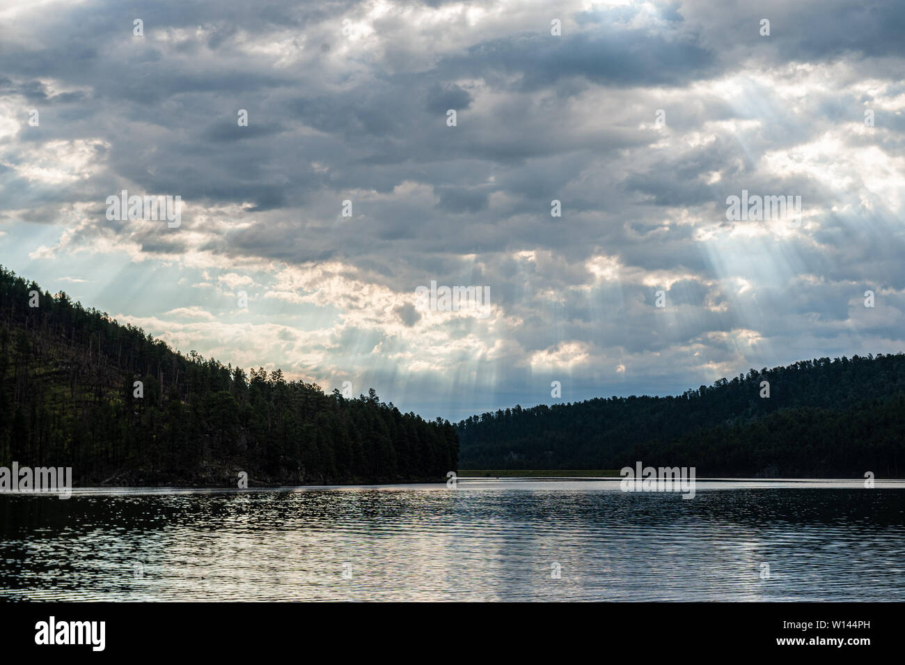 Sheridan Lake, in South Dakota's Black Hills, early in the Morning, after a thunder storm had passed over the area. Stock Photo