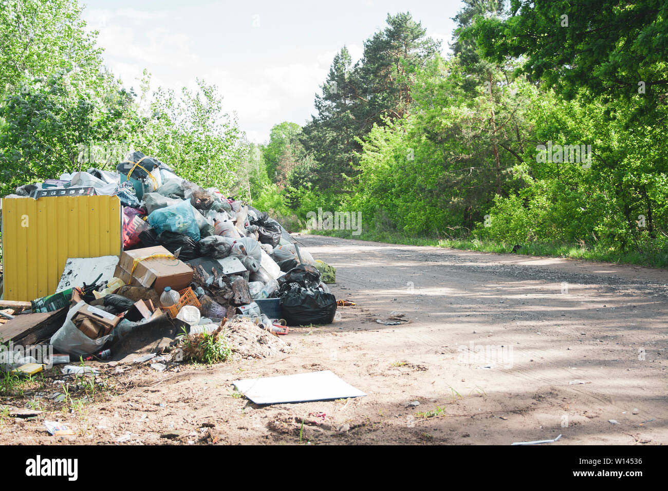 Illegal Dump Near The Country Sand Road In The Country On Sunny Day Trash Pollution In The Nature Dirty Dump Near Forest Woods Matte Toned Stock Photo Alamy Illegal Dump Near The Country Sand Road In The Country On Sunny Day Trash Pollution In The Nature Dirty Dump Near Forest Woods Matte Toned Stock Photo Alamy