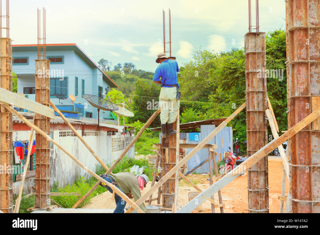 construction workers collaborating in the installation formwork workplace build a house Stock Photo