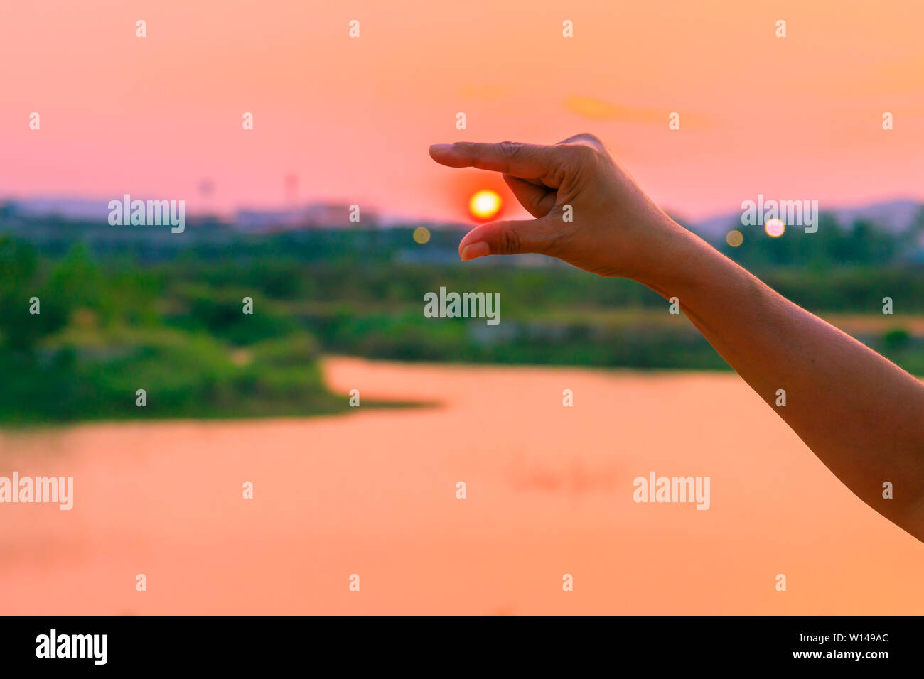 hands catch sun at sunset time concept. with copy space add text Stock Photo