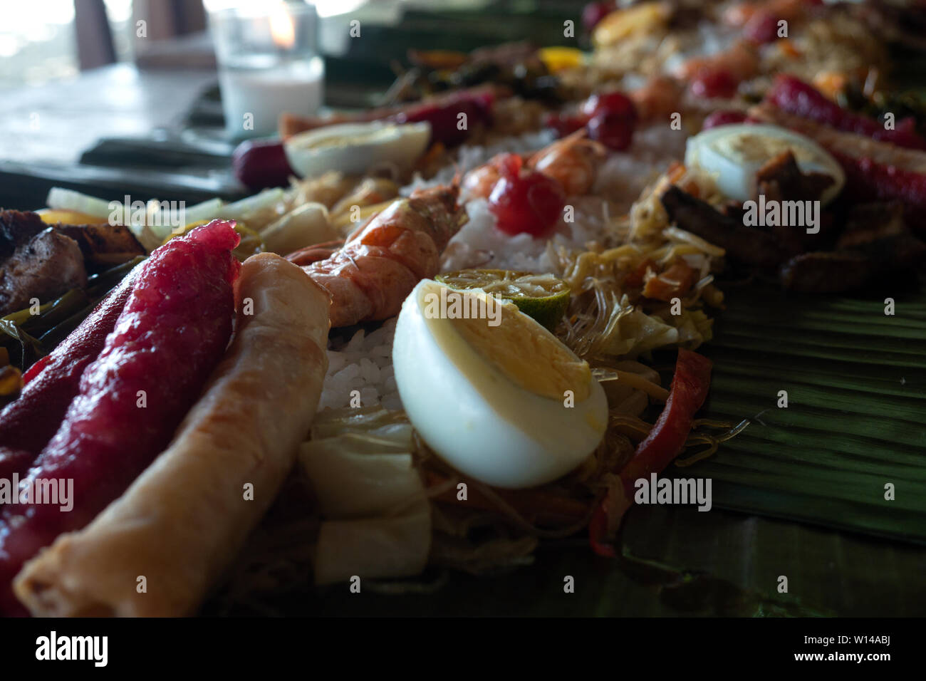 Filipino authentic traditional buffet philippine finger food on banana