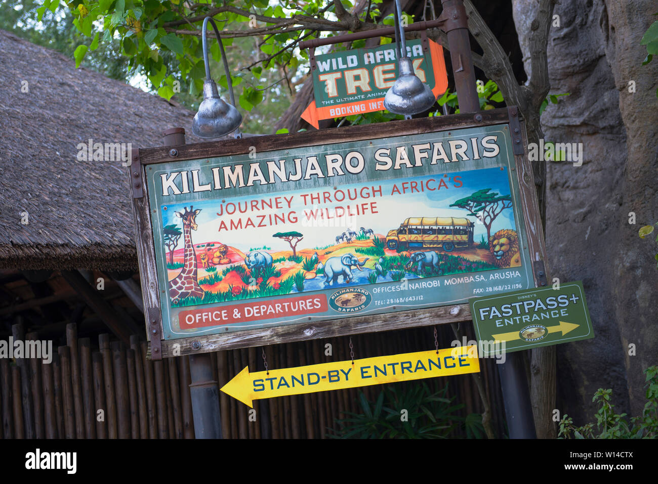 Disney Animal Kingdom, Kilimanjaro Safaris Sign, directions to Entrance Stand-by and FastPass, Disney World, Florida, Orlando, USA Stock Photo