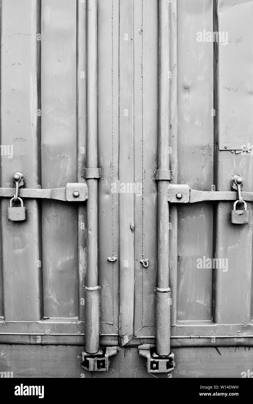 metal gray industrial container doors with locks Stock Photo