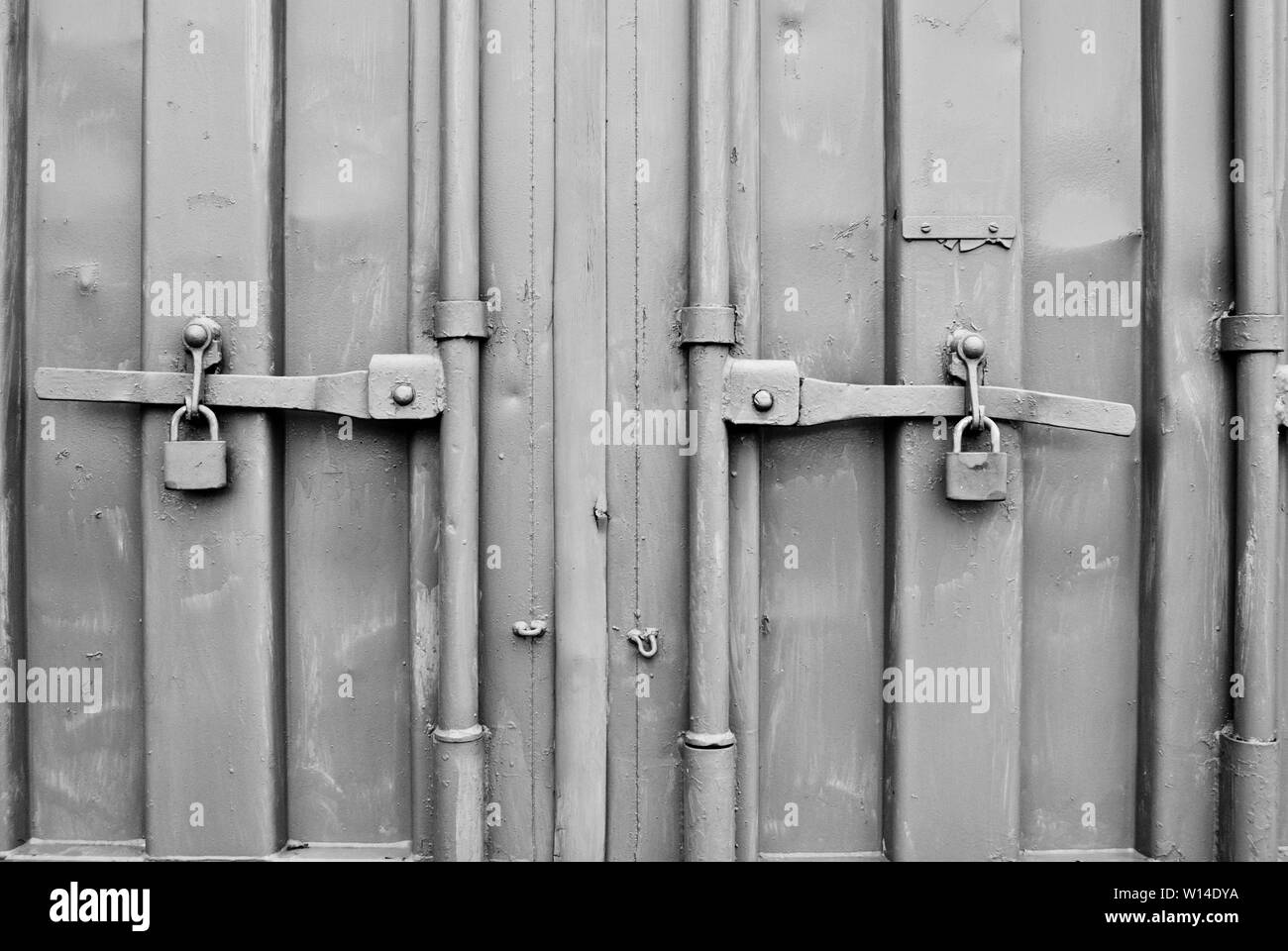 metal gray industrial container doors with locks Stock Photo