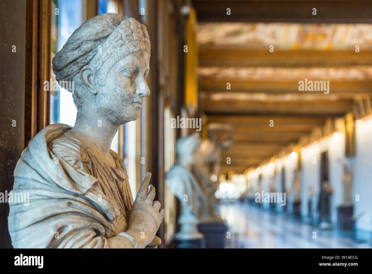 Florence, Italy - September 25, 2016: Statue in the hallway of Uffizi Gallery, one of the oldest and most famous art museums of Europe. Stock Photo