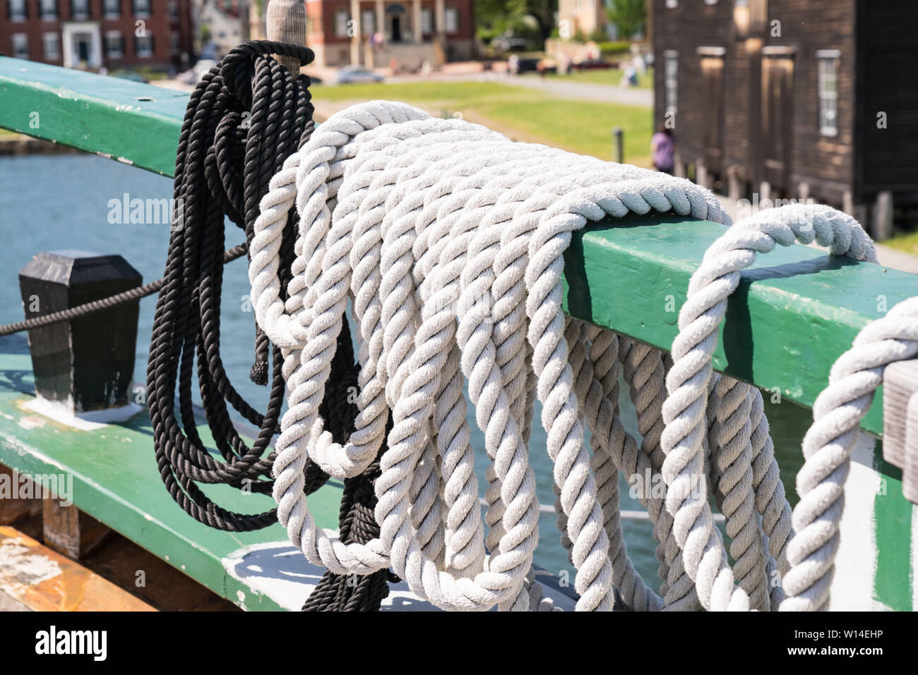 Ropes along the deck of an old historic sailing ship Stock Photo