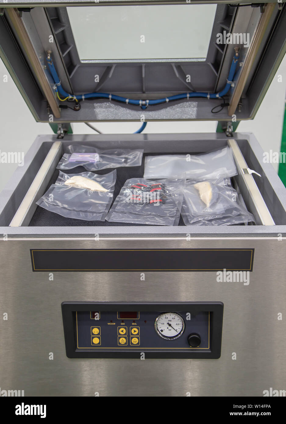 Heat sealing vacuum machine for food packaging Stock Photo Alamy