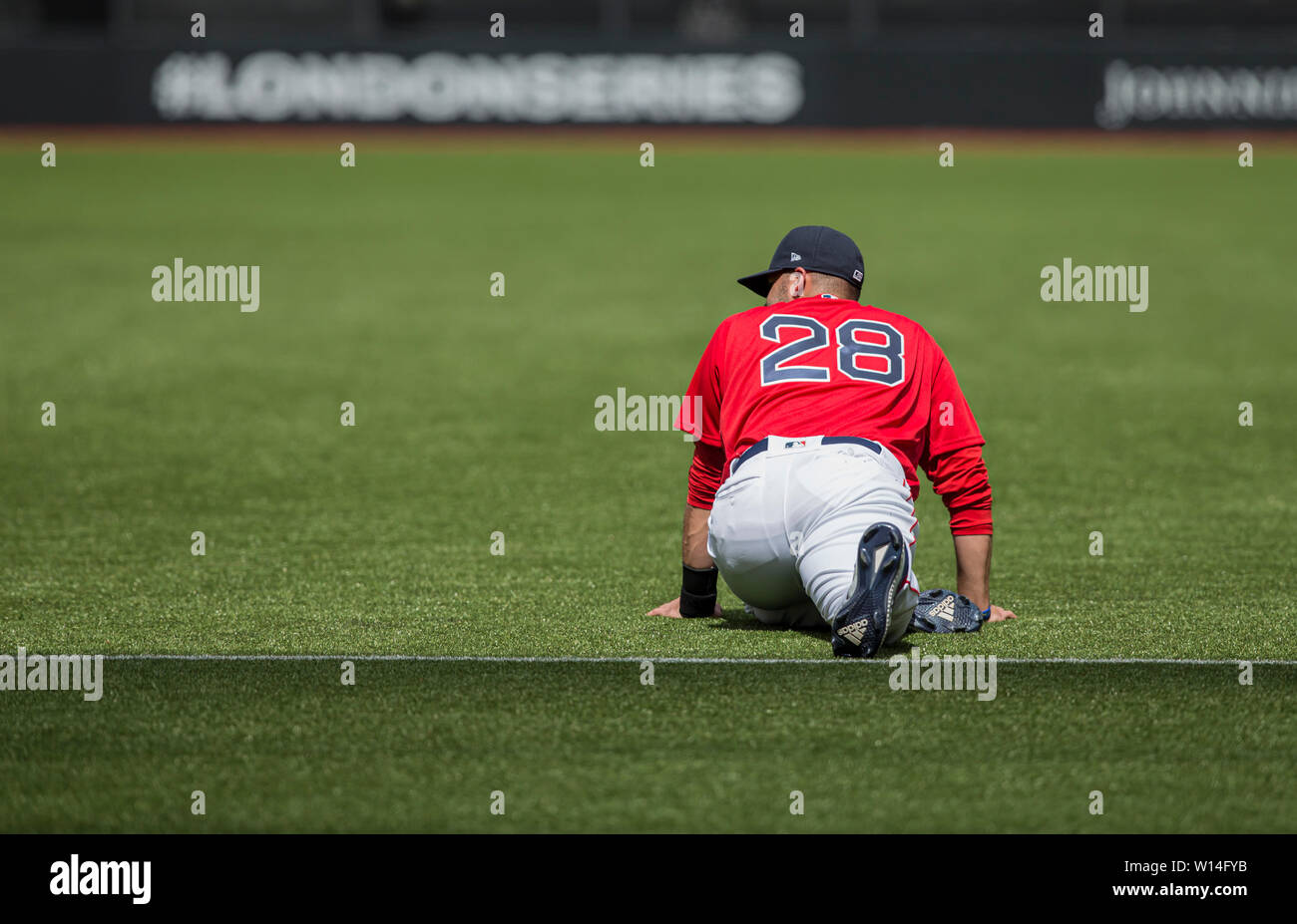 London Stadium, London, UK. 30th June, 2019. Mitel &amp; MLB Present London Series Baseball, Boston Red Sox versus New York Yankees; JD Martinez Outfield Right Field Player of the Boston Red Sox stretching on the field of play before the game Credit: Action Plus Sports/Alamy Live News Stock Photo