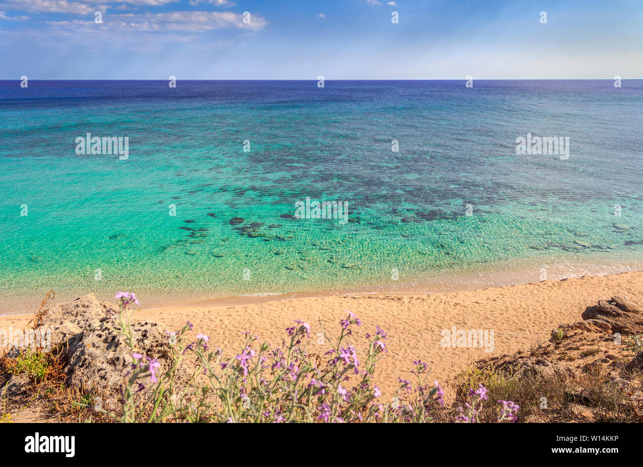 Apulia coast: Marina di Lizzano beach (Taranto). The coastline is characterized by a alternation of sandy coves and jagged cliffs. Stock Photo