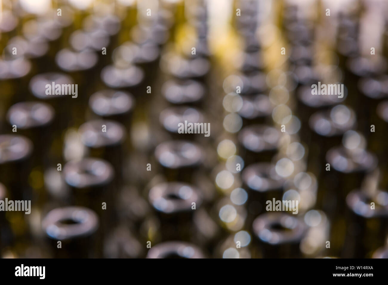 Wine bottles abstract blurred background, winemaking process to