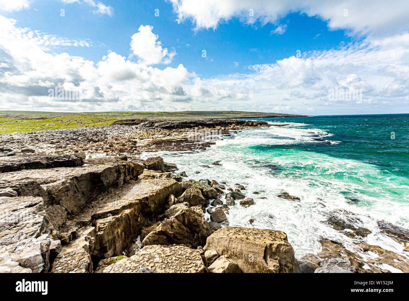 Spectacular landscape of the sea and limestone on the coast in Bothar nA hAillite, Geopark geosites, Wild Atlantic Way, beautiful spring day Stock Photo