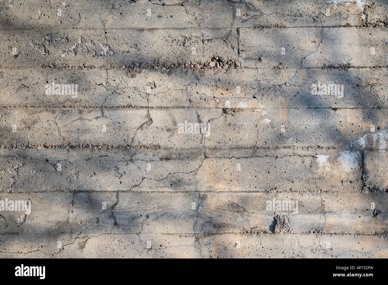 Old cracked and weathered concrete wall Stock Photo