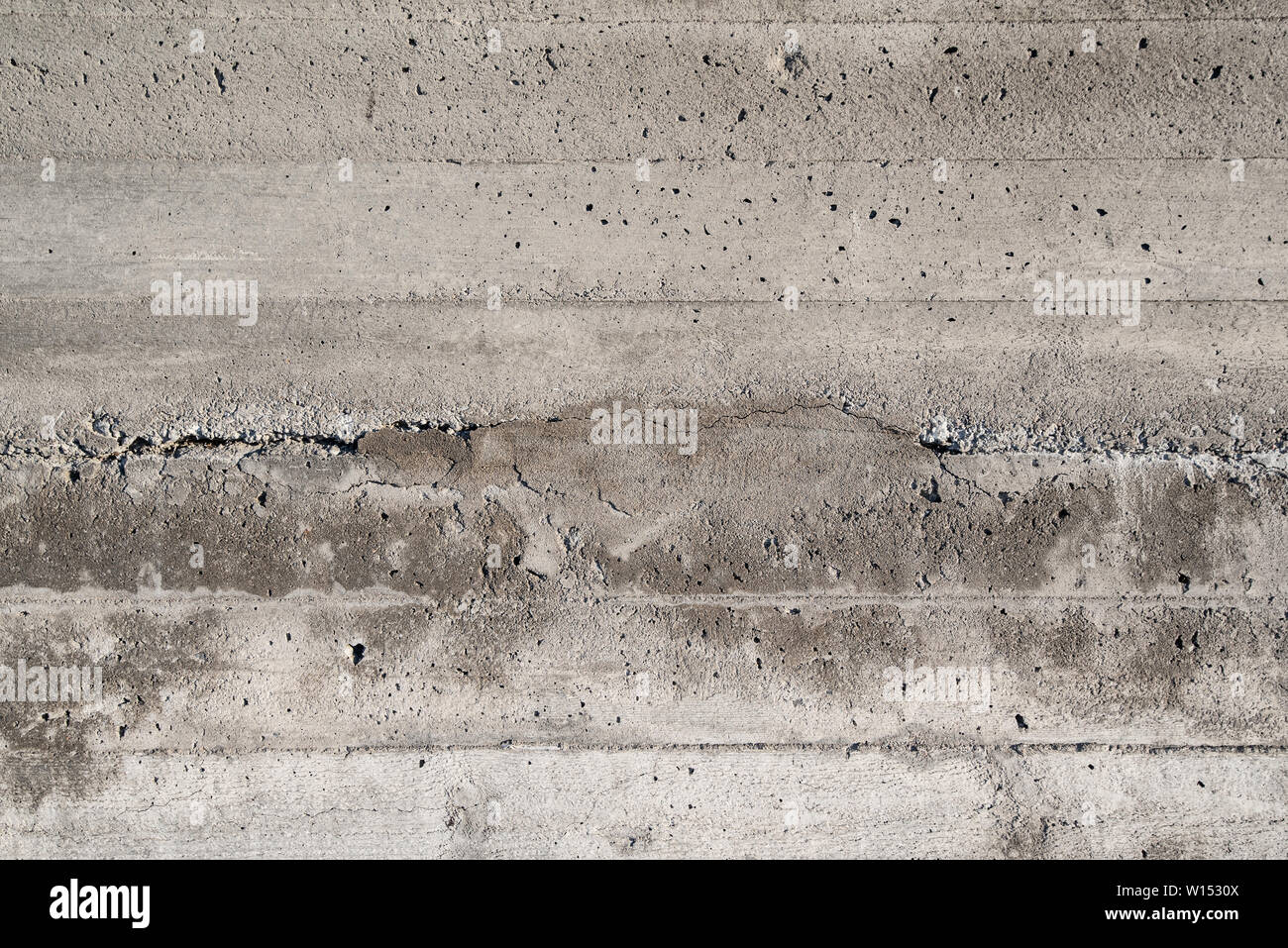 Old cracked and weathered concrete wall Stock Photo