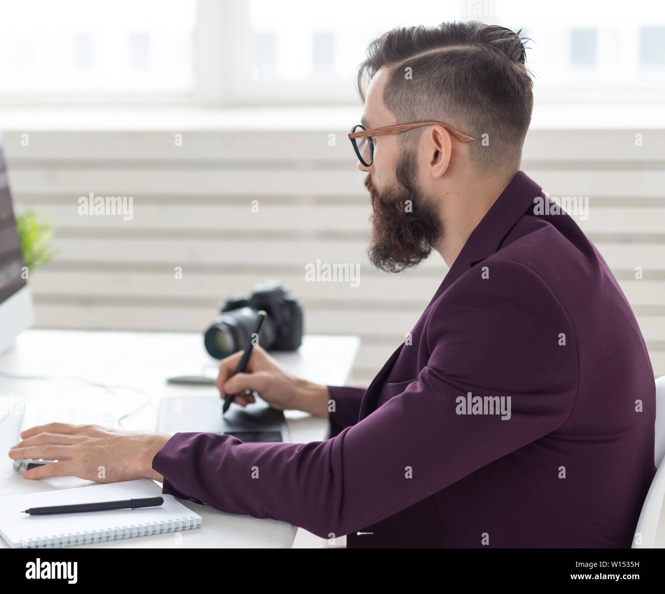 people, design and style concept - graphic designer sketching new ...
