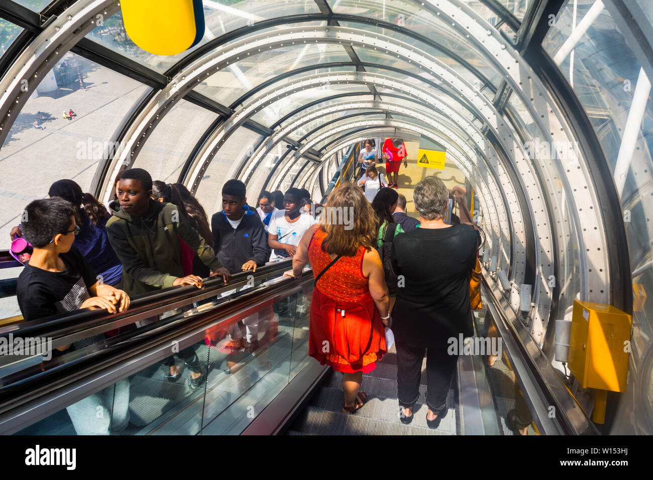 Tourists using the escalators in the Centre Pompidou art gallery, Paris, France. Stock Photo