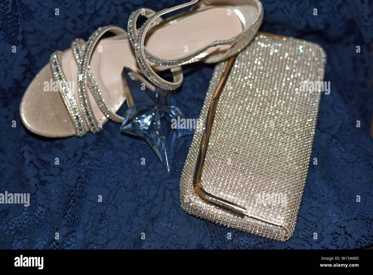 gold heels and clutch