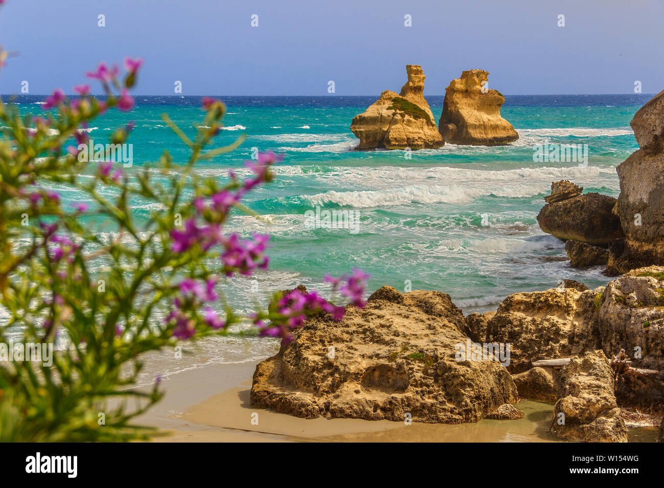 The most beautiful coast of Apulia: Torre Dell'Orso Bay, ITALY (Lecce).Typical seascape of  adriatic coastline of Salento: view of the two faraglions. Stock Photo
