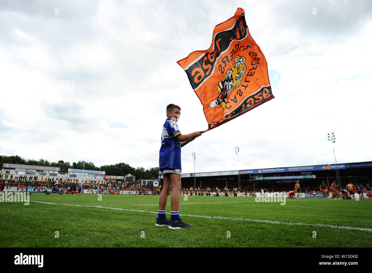 A mascot waves a flag before the Betfred Super League match at the Mend-A-Hose Jungle, Castleford. Stock Photo