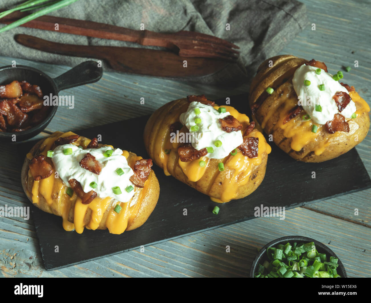 baked potato stuffed with cheese, bacon and sour cream, loaded