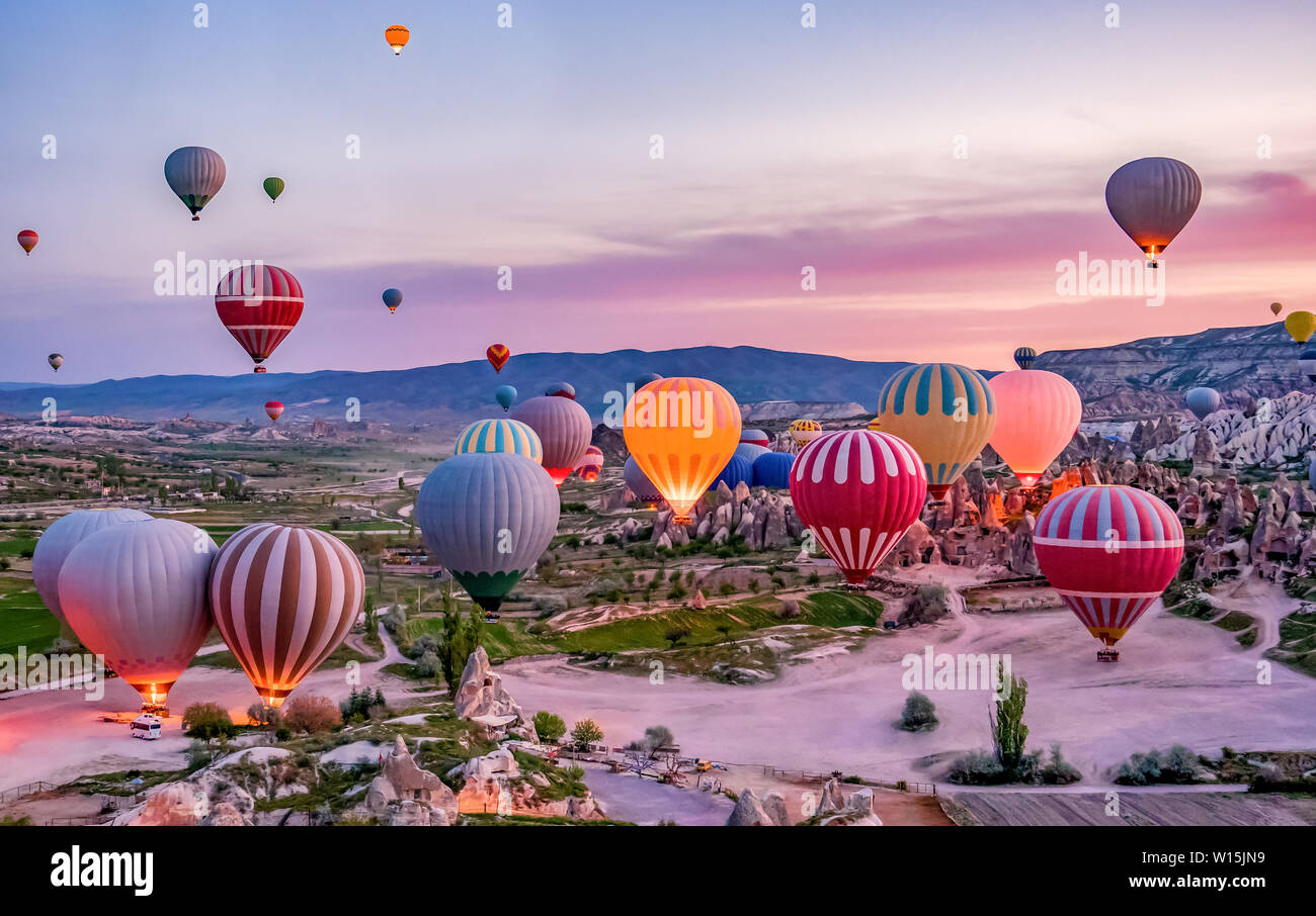Colorful hot air balloons before launch in Goreme national park, Cappadocia, Turkey Stock Photo