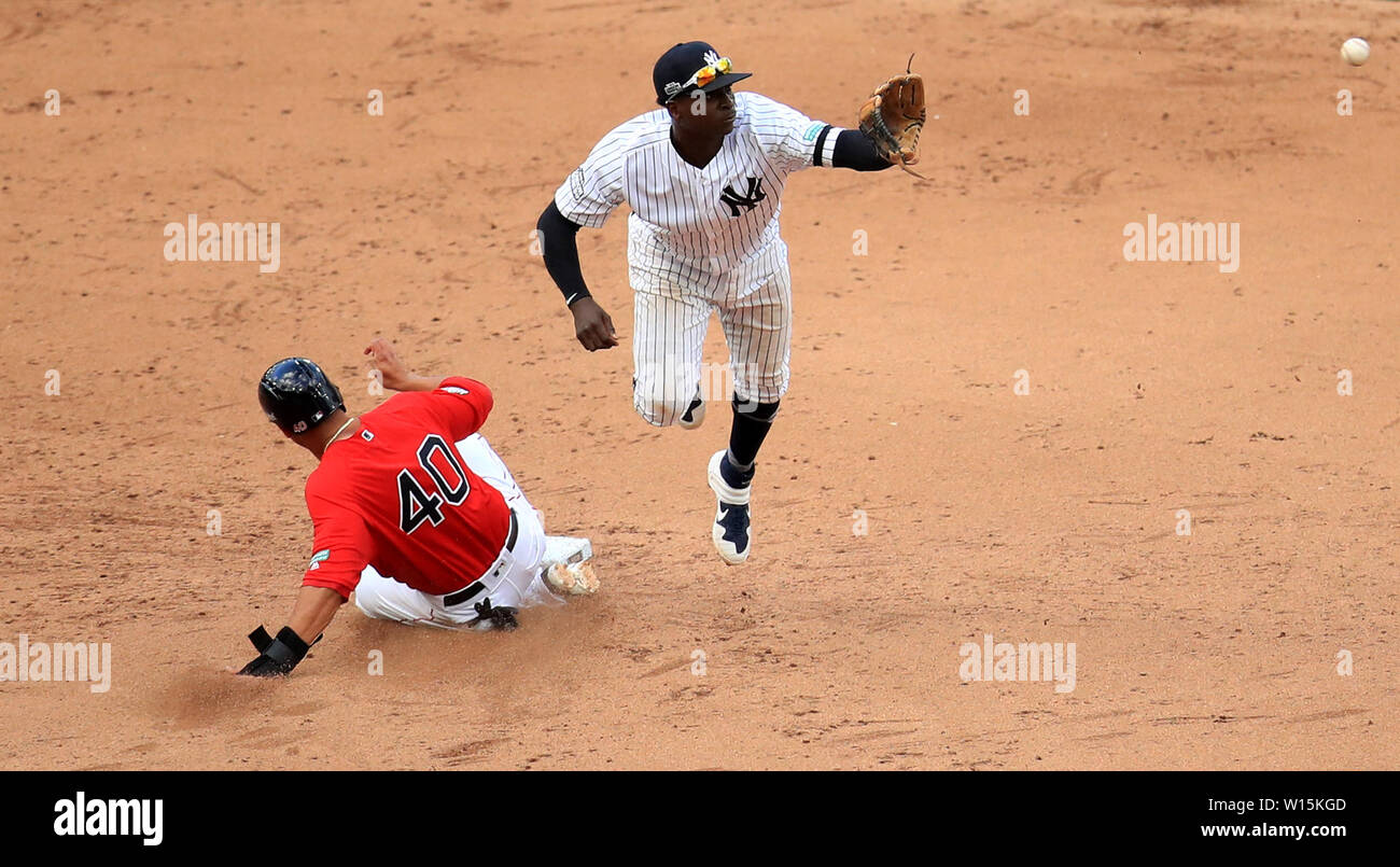 Boston Red Sox' Marco Hernandez slides for third base during the MLB London Series Match at The London Stadium. Stock Photo