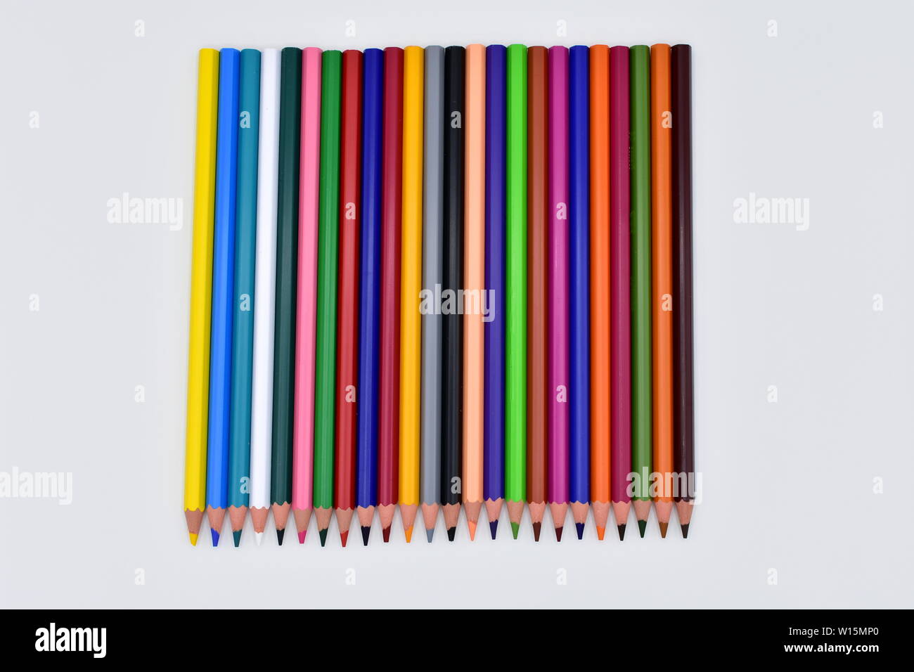 Wooden pencils with colours on a white background Stock Photo - Alamy