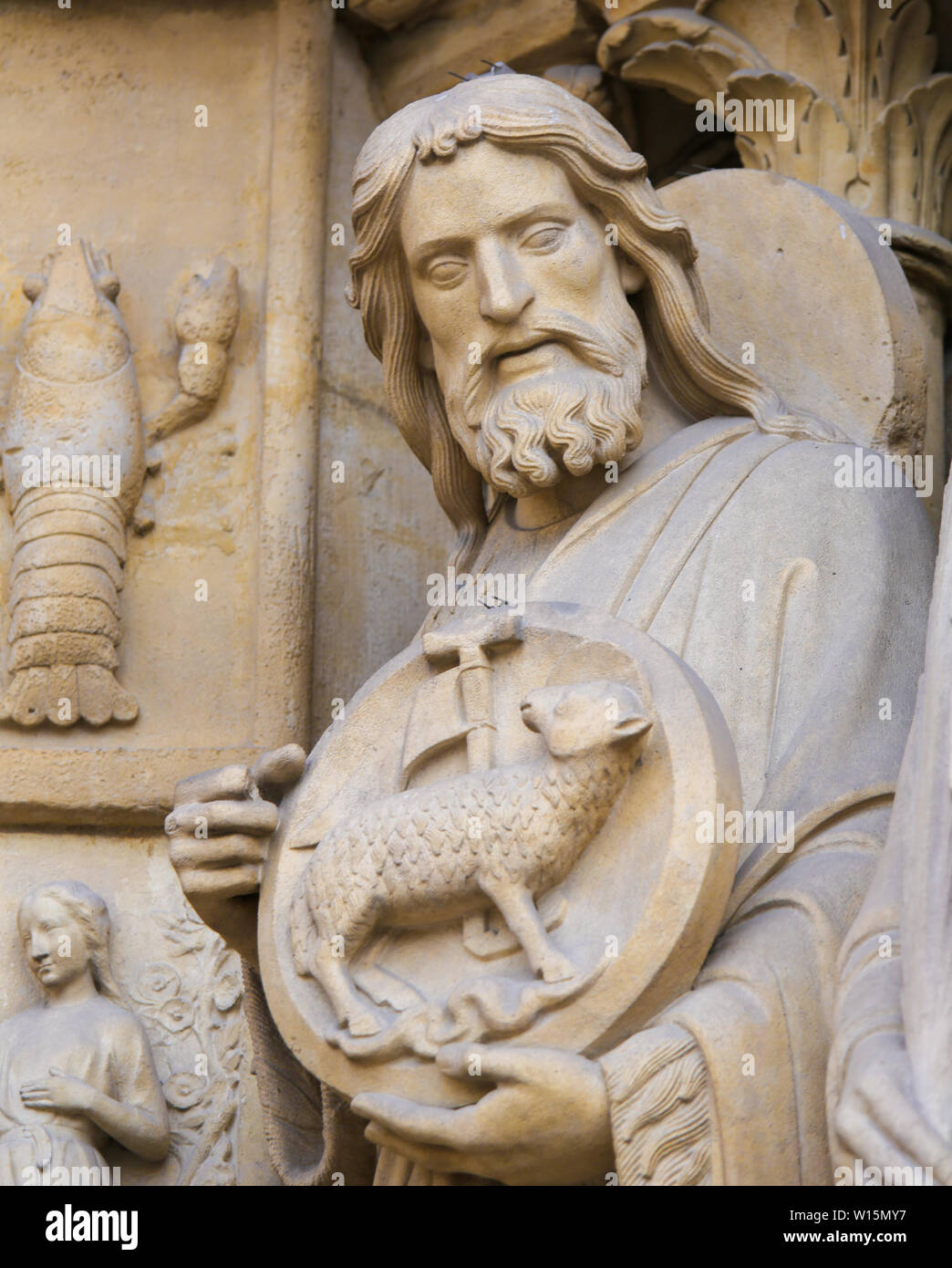 Medieval Statue of Saint John the Baptist at the Cathedral of Notre Dame, Paris, France. Stock Photo