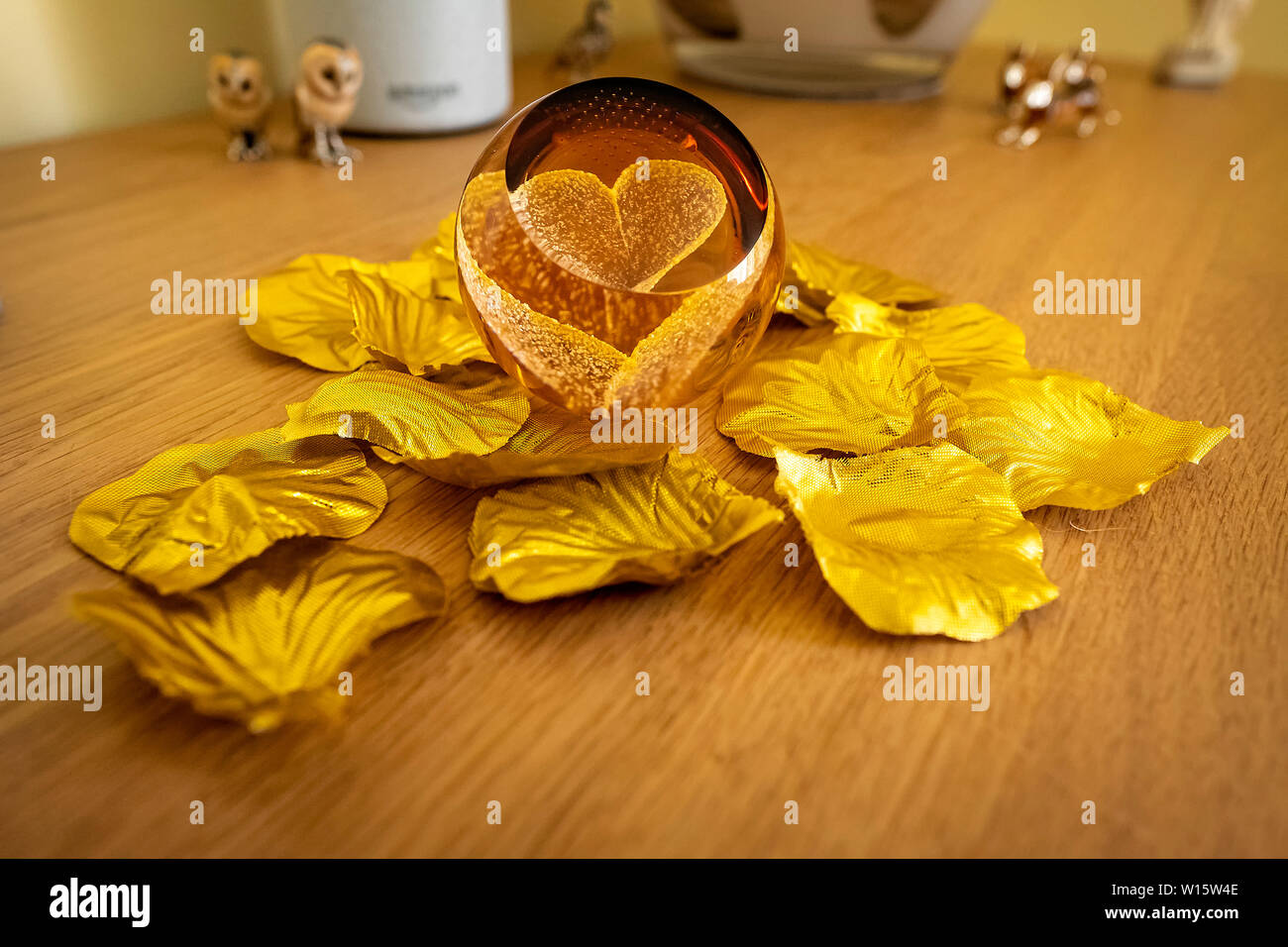 Glass Heart paper weight used as a celebration of fifty years being married. Stock Photo