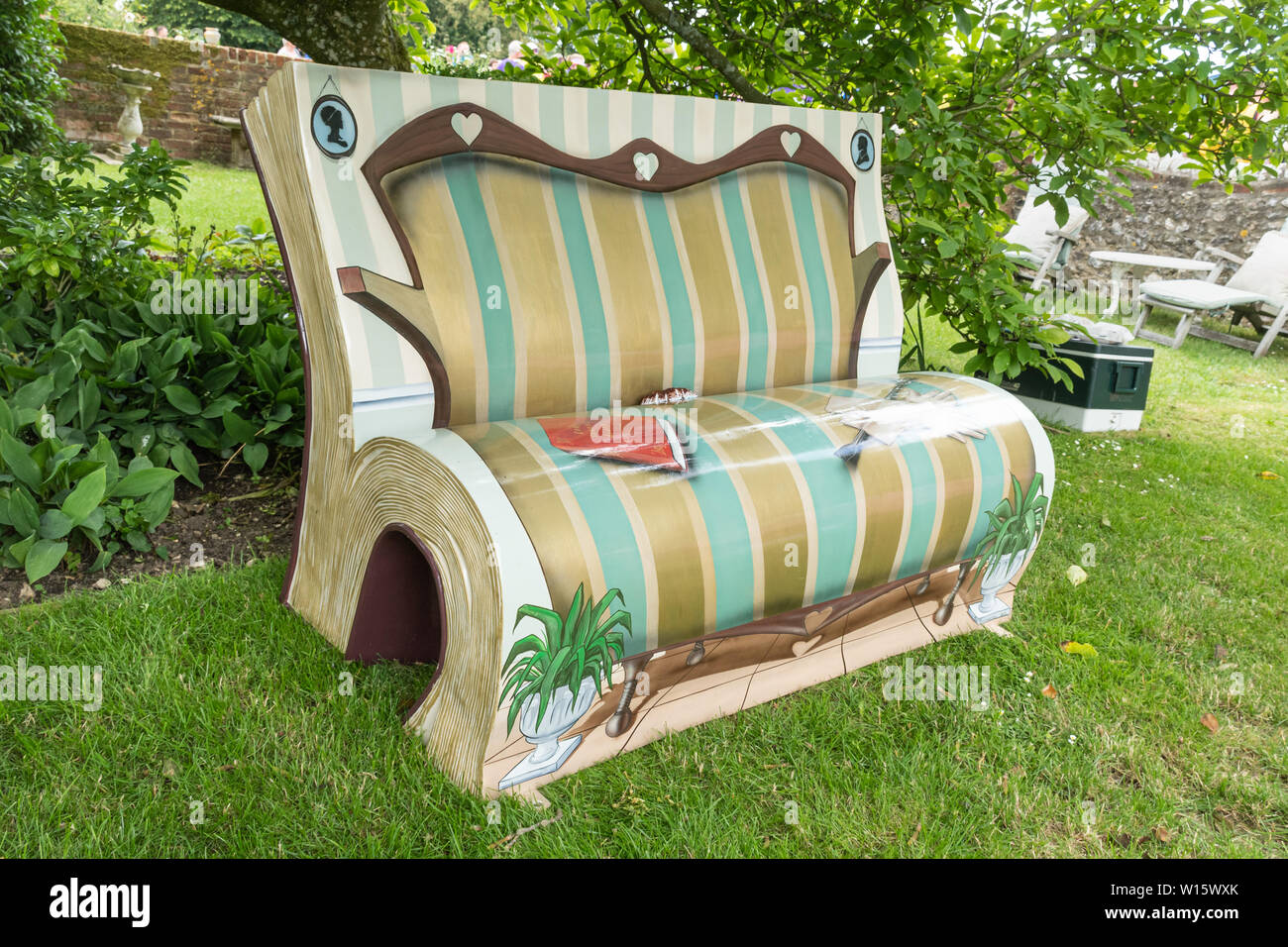 Art deco style garden bench in the form of a book, UK Stock Photo