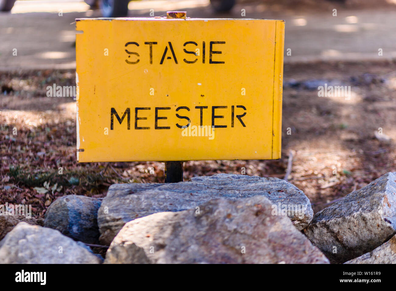 Sign in Afrikaans saying 'Stasie Meester' (tr: Station Master) at Otjiwarongo train station, Namibia Stock Photo