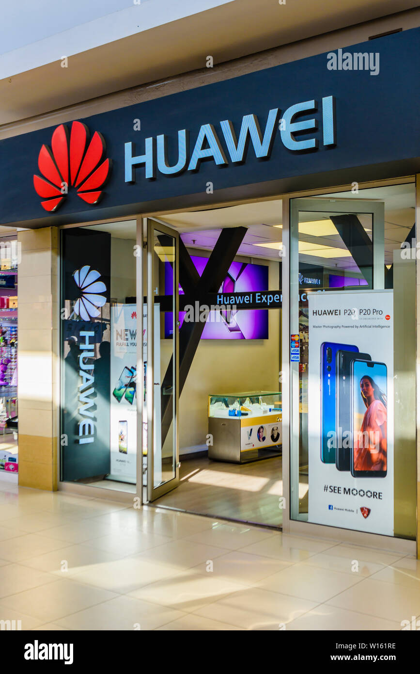 Huawei mobile phone consumer store in a shopping mall. Stock Photo