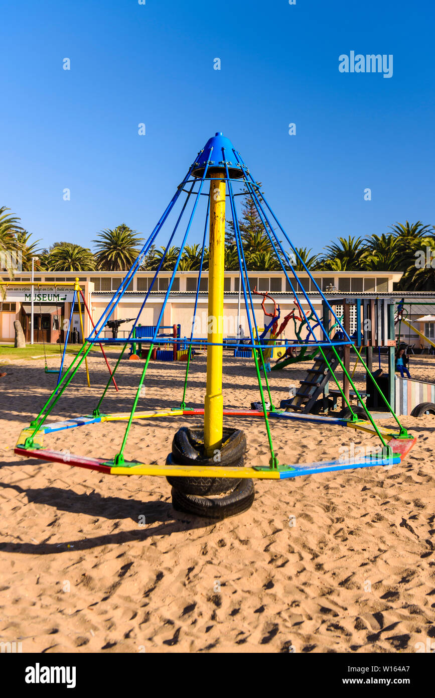 Old fashioned 'Witches Hat' playground ride.  These were banned in the 1980s in most places due to the high numbers of broken arms and legs caused by Stock Photo