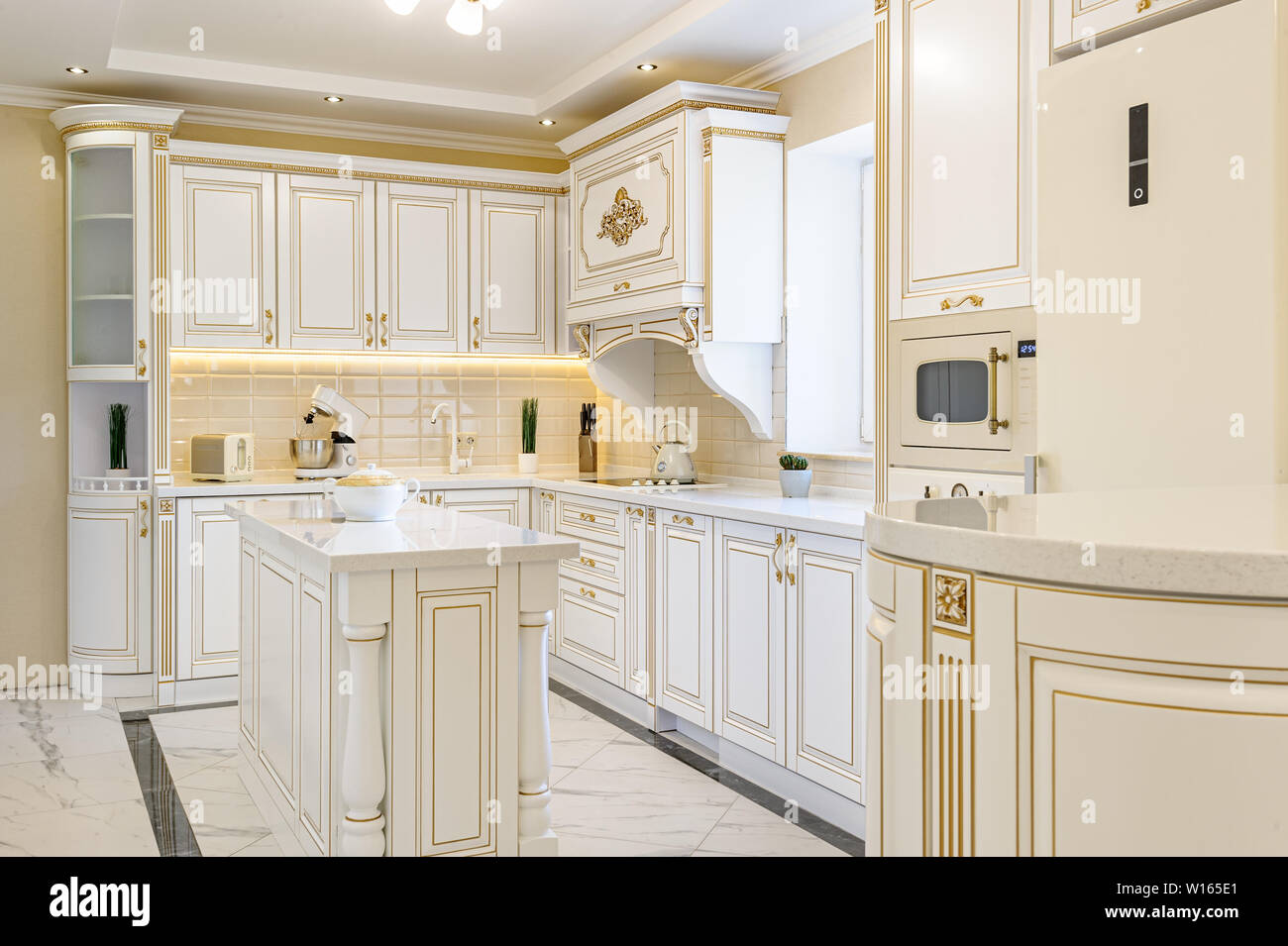neoclassic style luxury kitchen interior with island Stock Photo