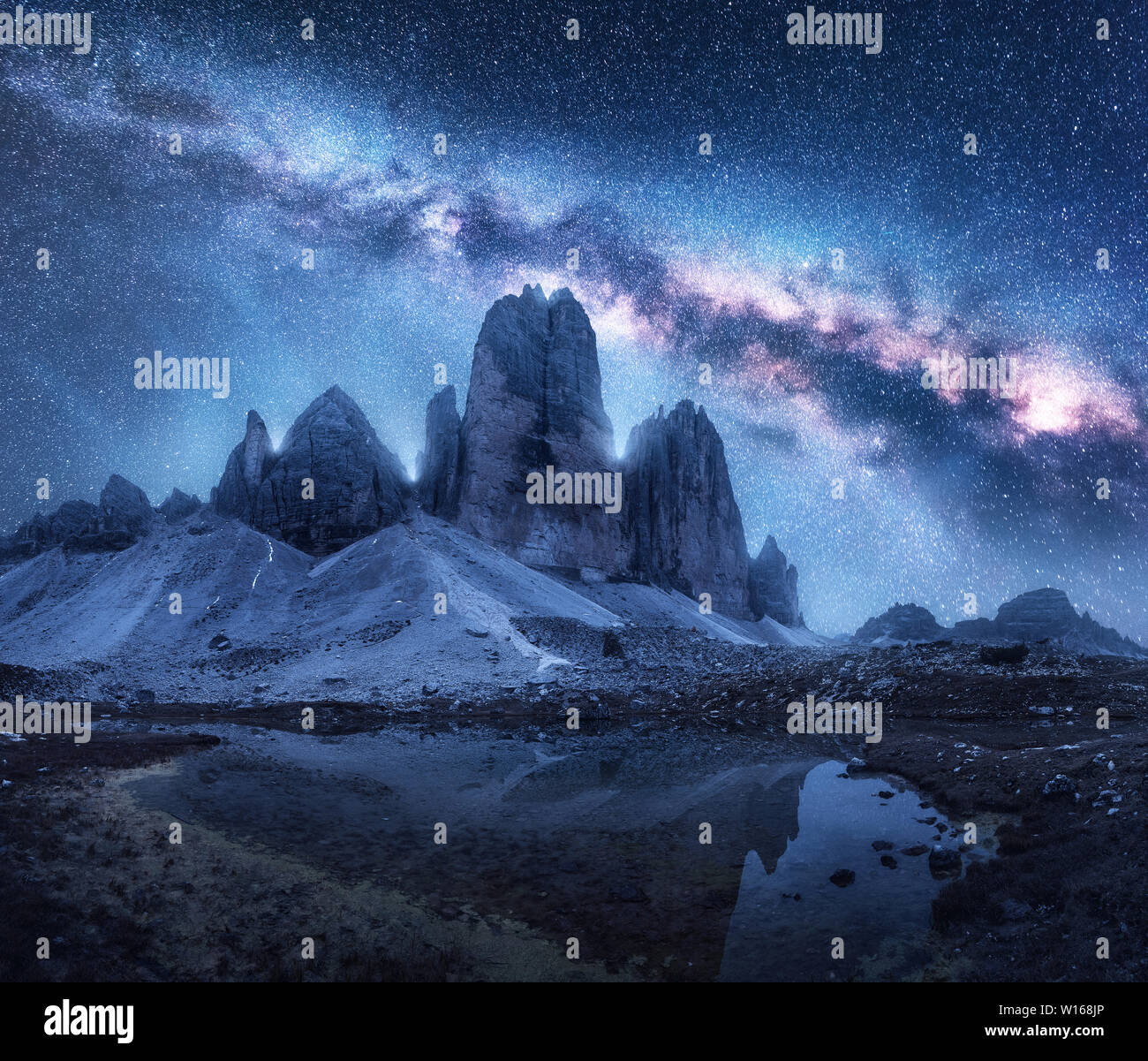 Milky Way over mountains at night in summer Stock Photo