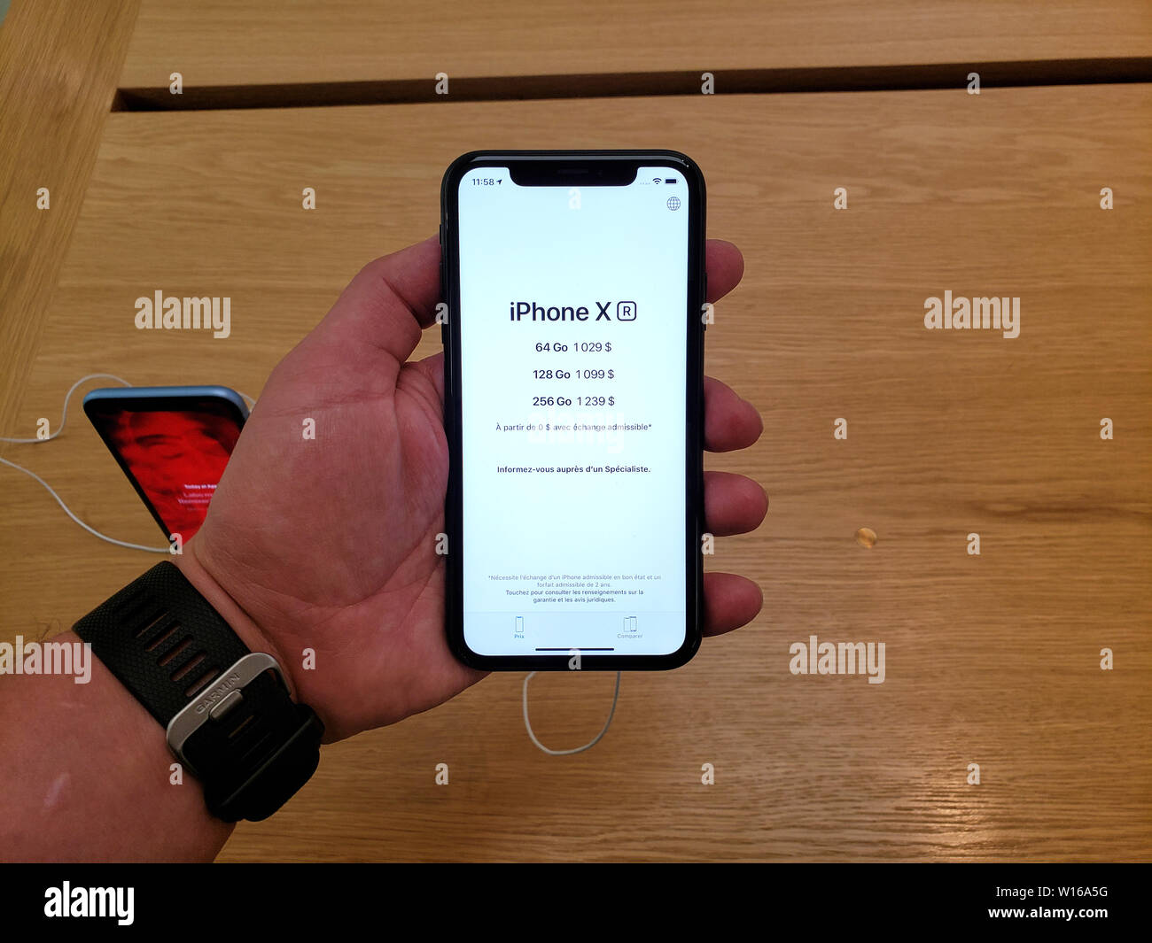 MONTREAL, CANADA JUNE 20, 2019 Apple iPhone XR in a hand at Apple
