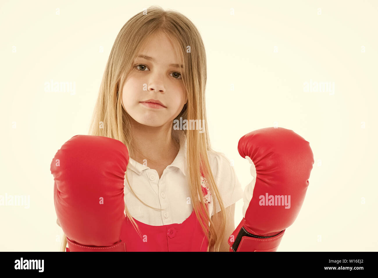 Punching. Childhood development and health. Success. Adorable boxer