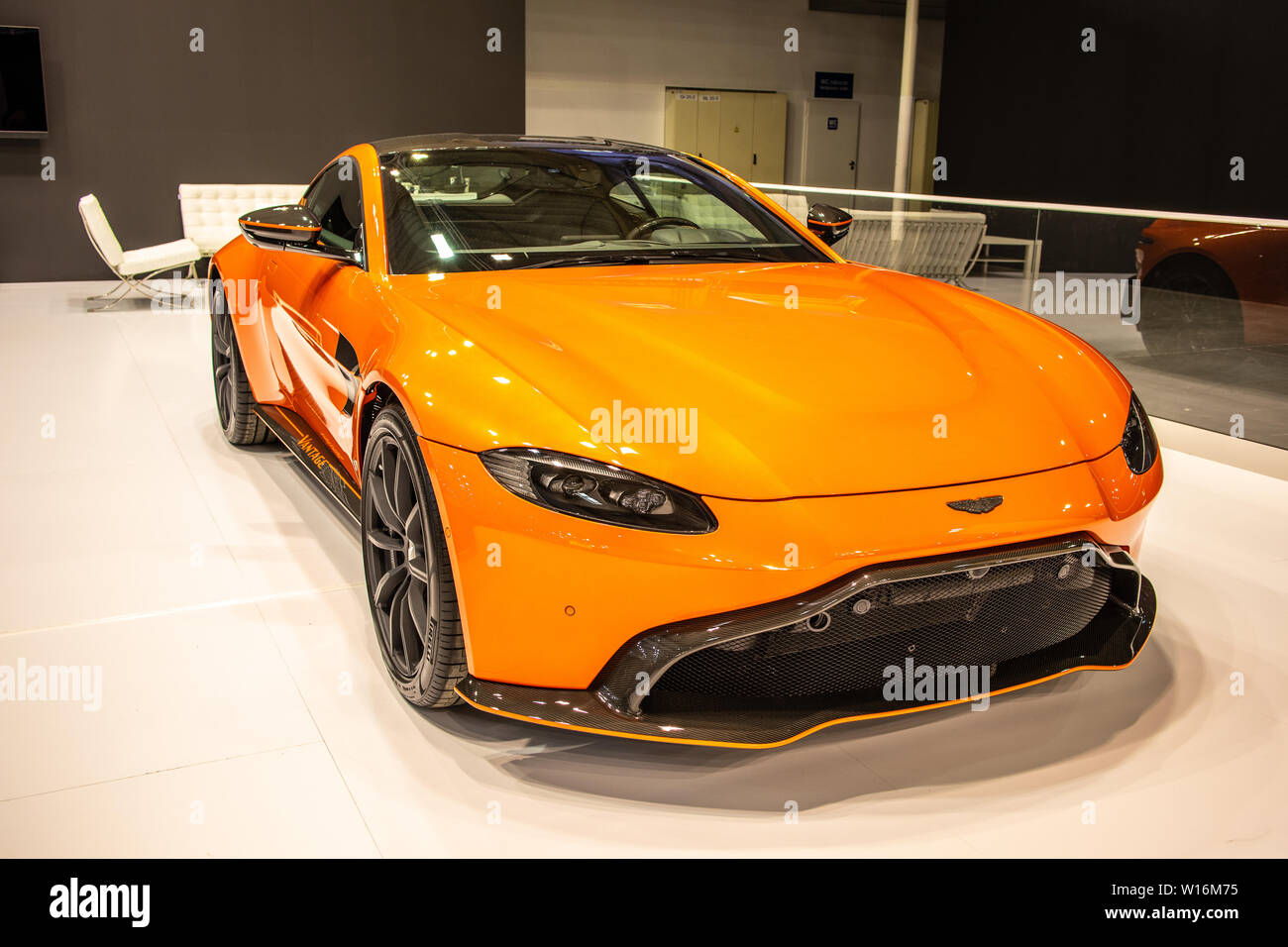 Poznan, Poland, March 2019 orange Aston Martin V8 Vantage, Poznan