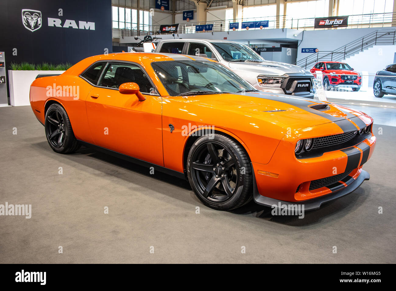 Poznan, Poland, March 2019: metallic orange Dodge Challenger SRT