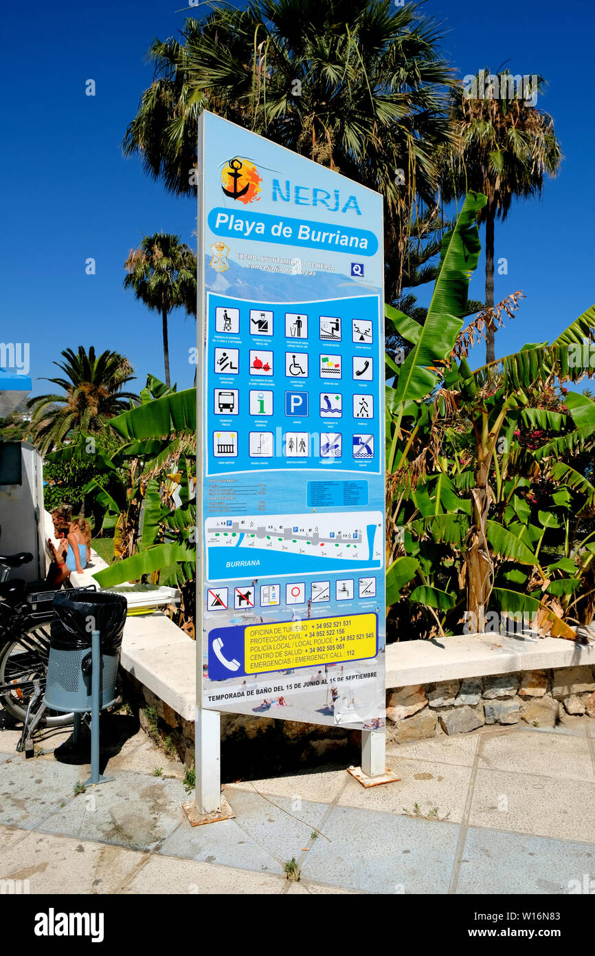 Playa de Burriana safety and beach information sign for visitors and tourists; Nerja, province of Malaga, Spain. Stock Photo