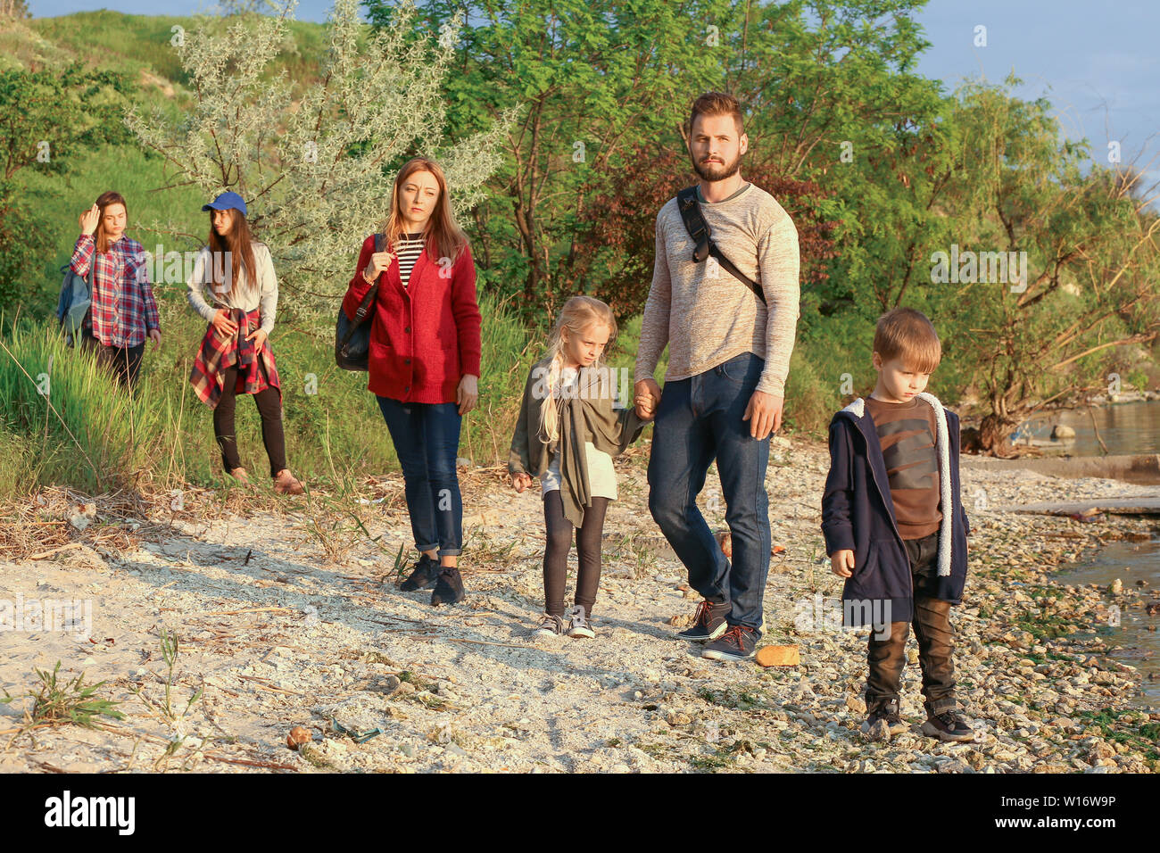 Group Escaping Group of illegal migrants escaping from their country Stock Photo - Alamy
