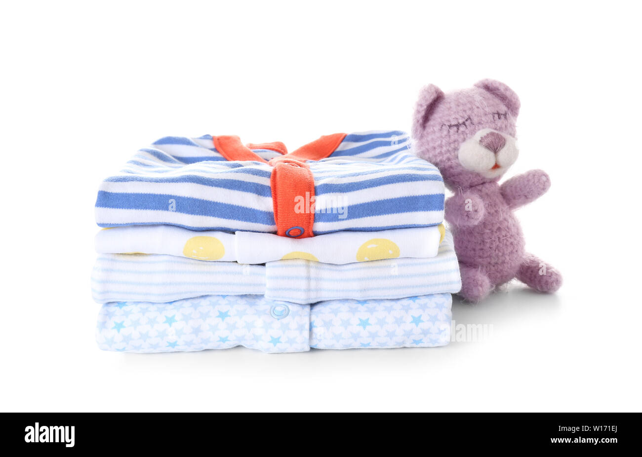 Stack of baby clothes on white background Stock Photo - Alamy