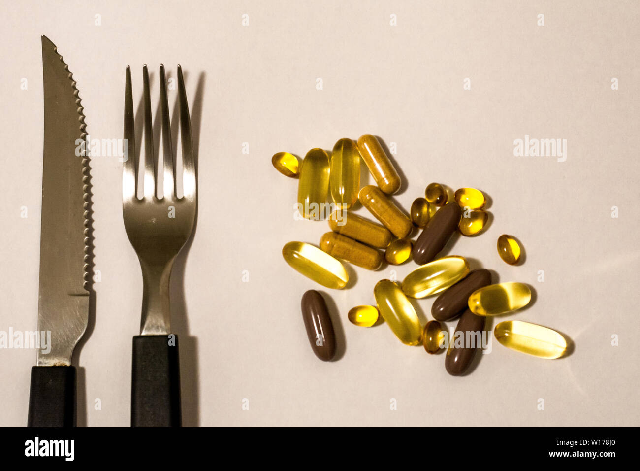 Capsules Pills Fork And Knife As If It Were Future Food Stock