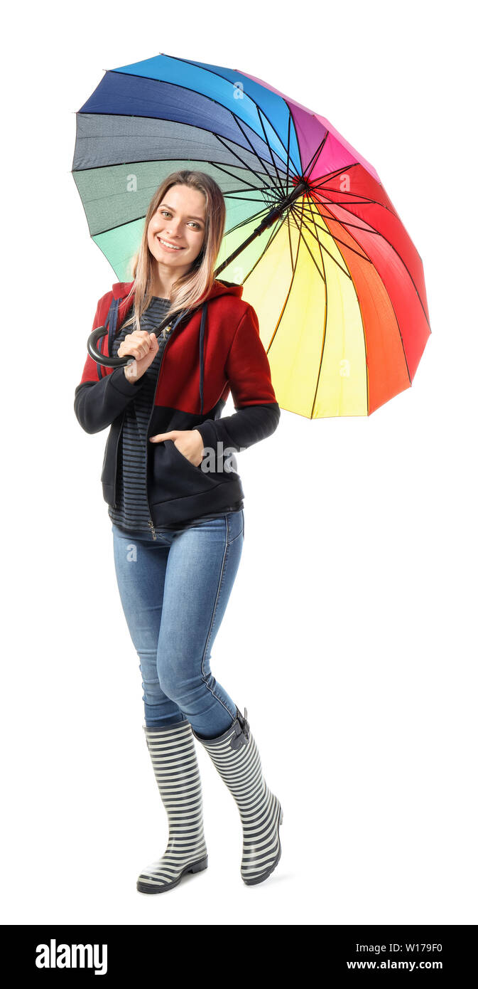 Beautiful young woman with umbrella on white background Stock Photo - Alamy