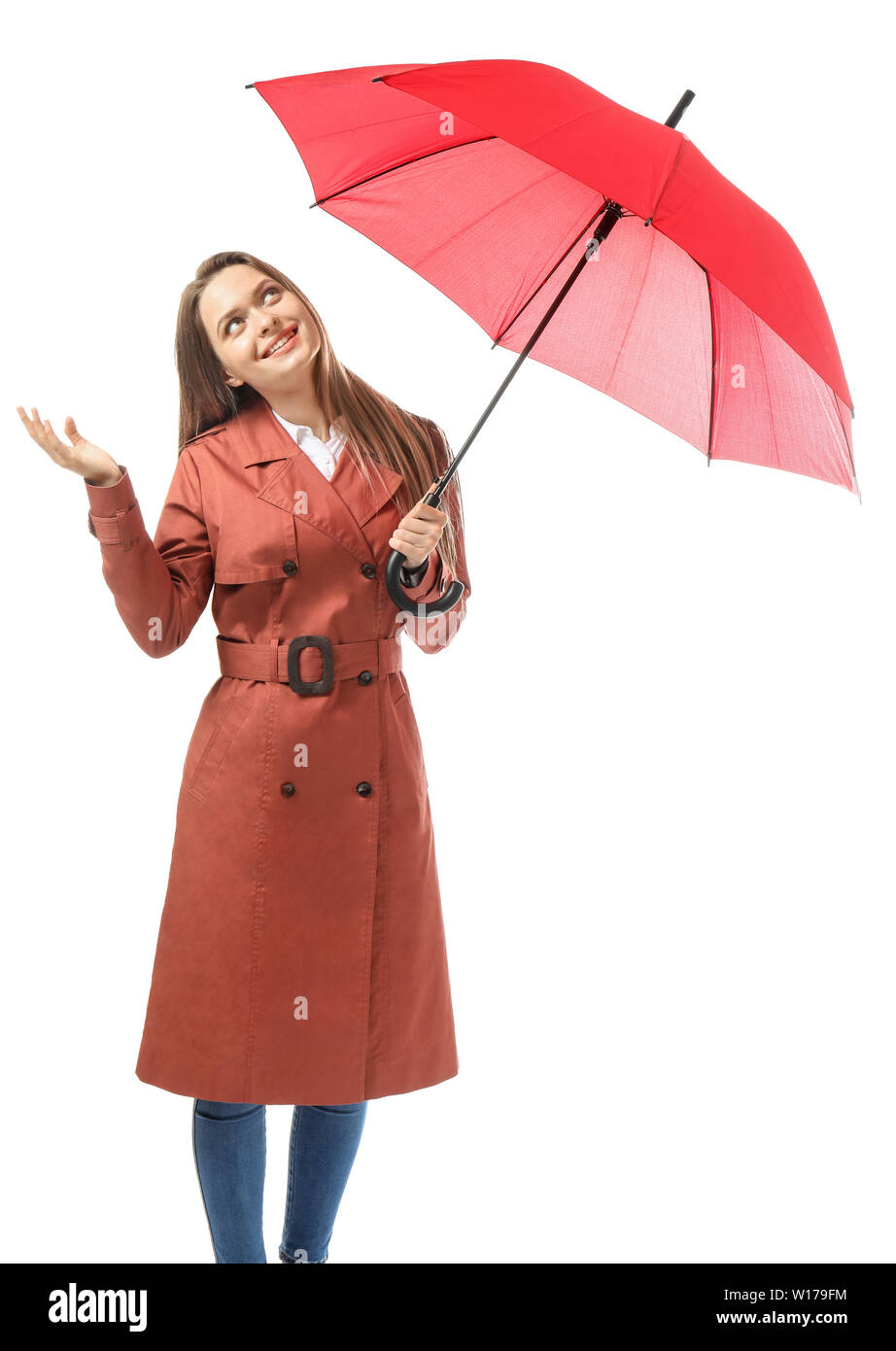 Beautiful young woman with umbrella on white background Stock Photo - Alamy