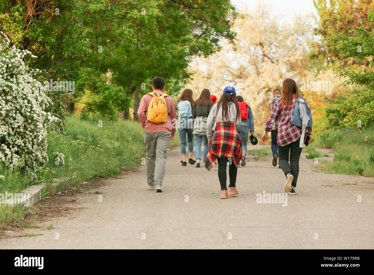 Group Escaping Group of illegal migrants escaping from their country Stock Photo - Alamy